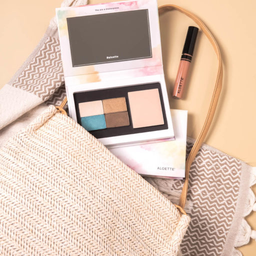 Beauty Bento + Lip Shine + on Tan and bag.jpg